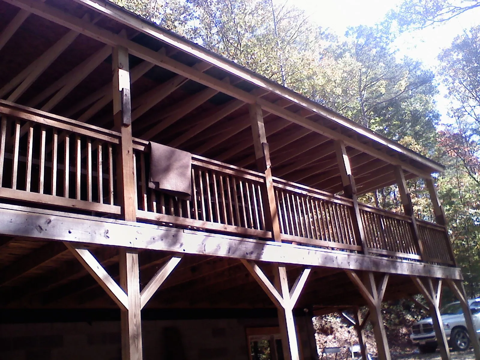Timber framing under a new elevated porch and deck — Roof Leak Repair in Allegan by Roofing Brothers